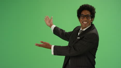 Happy-Businessman-gesturing-with-arms-on-green-screen
